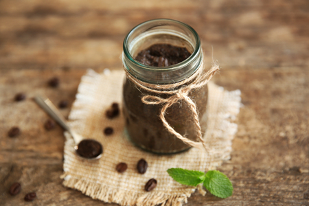 Coffee body scrub in glass jarの写真素材