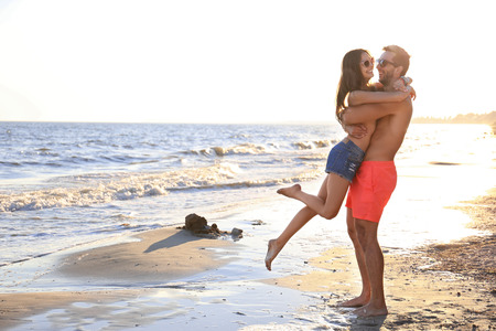 Lovely couple on tropical beachの写真素材