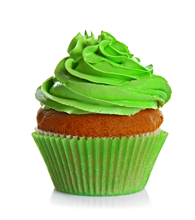 Fresh tasty cupcake isolated on whiteの写真素材