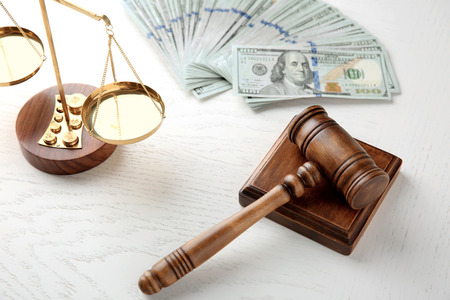Gavel and scales on white backgroundの写真素材