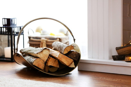 Logs near decorative Christmas fireplace, closeupの写真素材