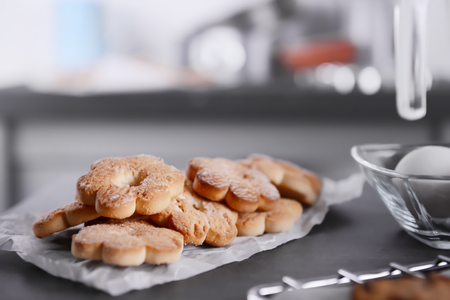 Freshly baked cookies on baking paperの写真素材