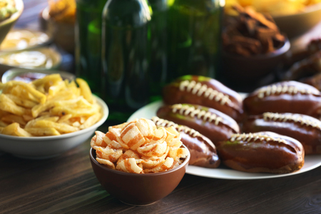 Tasty snacks and beer for football partyの写真素材