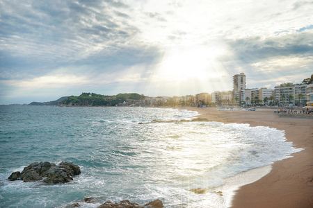Beautiful beach and sea at sunsetの写真素材