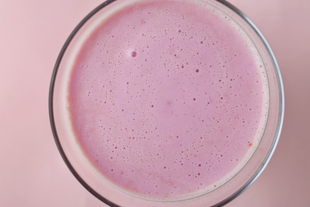 Glass of delicious milk shake, closeup
