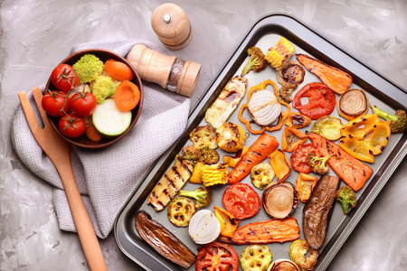 Grilled vegetables on baking trayの写真素材