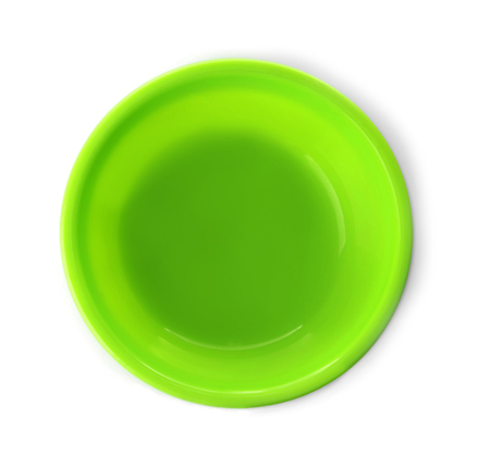 Bright plastic plate for child on white backgroundの写真素材