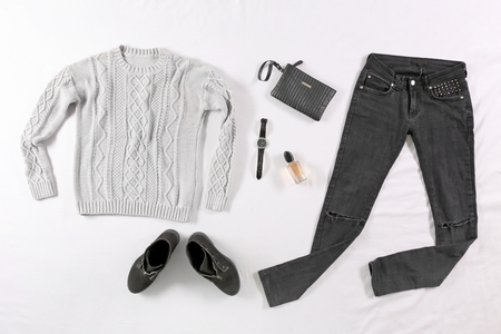 Modern clothes on bedの写真素材