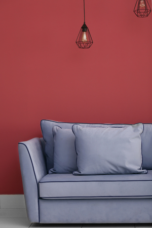New cozy sofa in empty roomの写真素材