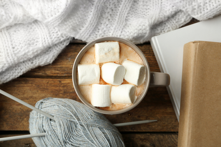 Hot drink with marshmallows on table, top viewの写真素材