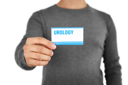 Man holding business card. Urology conceptの写真素材