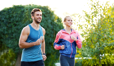 Sportsmen running in park