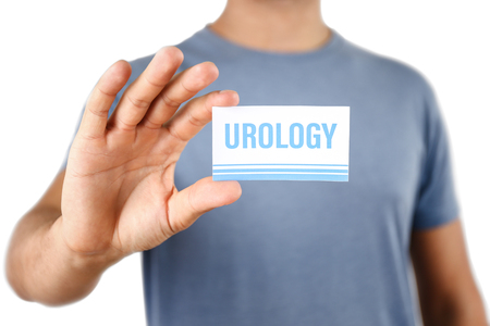 Man holding business card. Urology conceptの写真素材