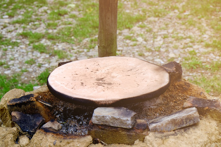 Stone plate for preparation food on fire outdoors