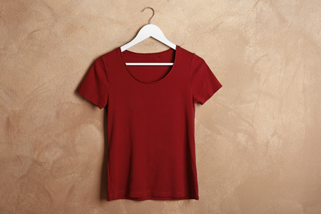 Blank maroon t-shirt on grunge backgroundの写真素材