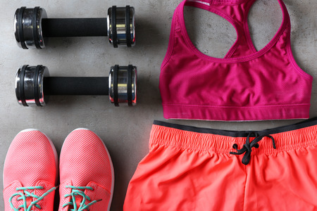 Sport clothes and equipment on tableの写真素材