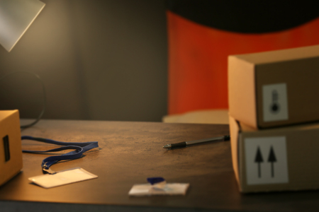 Carton boxes on table in room