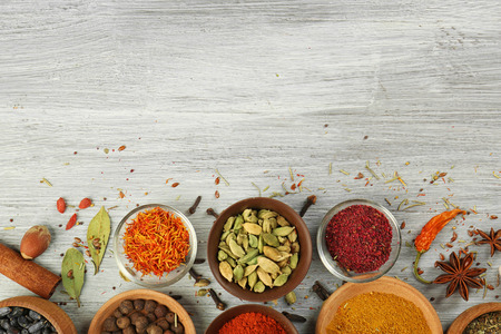 Aromatic spices on wooden backgroundの写真素材