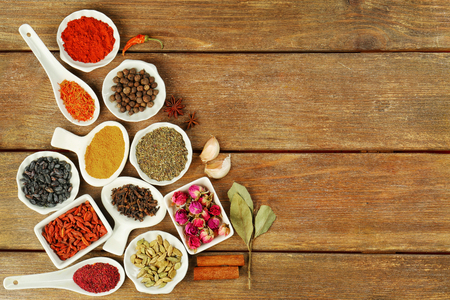 Aromatic spices on wooden backgroundの写真素材