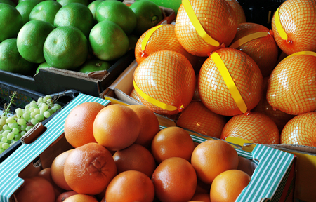 Cardboard boxes with fruits on marketの写真素材