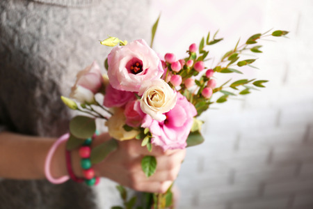 Woman holding bouquet of fresh flowersの写真素材