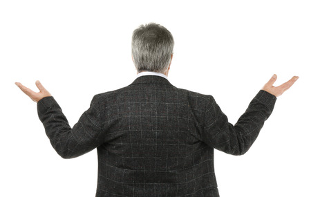 Senior businessman standing back on white background