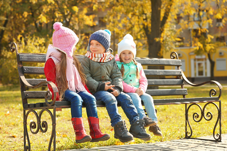 Group of children having fun walking in parkの写真素材
