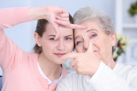 Grandmother and granddaughter, closeup