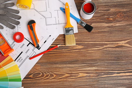 House project, color swatches and tools on wooden tableの写真素材
