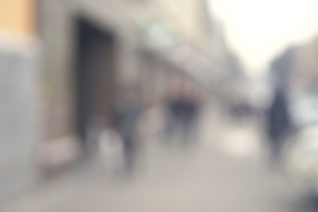 Blurred background of crowded city streetの写真素材