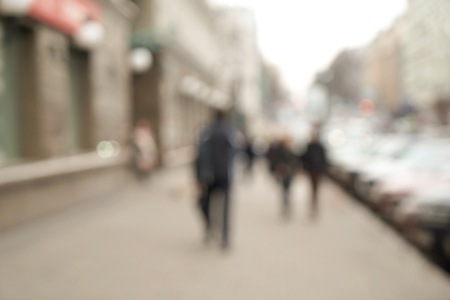 Blurred background of crowded city streetの写真素材