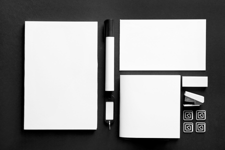 Flat lay of stationery on black backgroundの写真素材