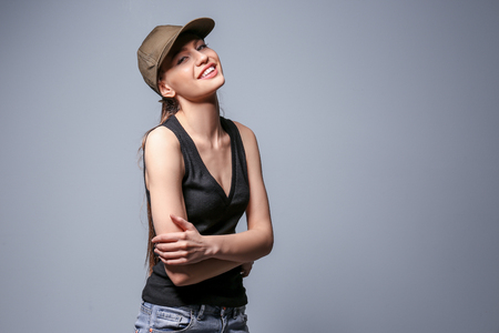 Beautiful young woman on color backgroundの写真素材