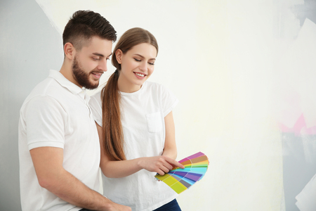 Couple choosing colors for wallの写真素材