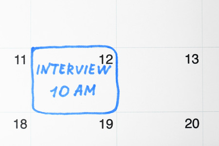 Job interview date on calendarの写真素材
