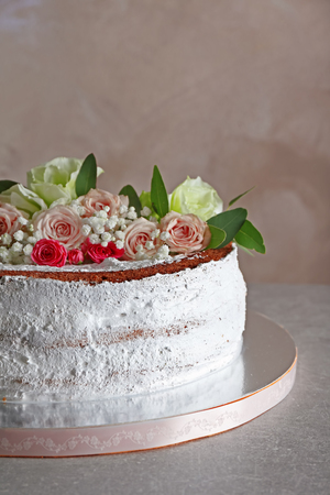 Delicious wedding cake on grey textured backgroundの写真素材