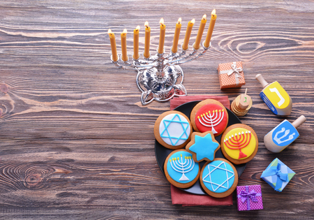 Beautiful composition for Hanukkah on wooden tableの写真素材