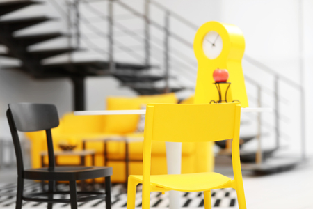 Modern living room interior with yellow furnitureの写真素材