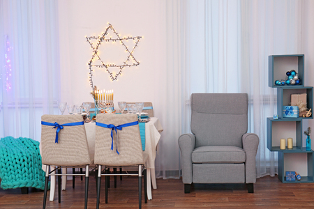 Interior of beautiful living room decorated for Hanukkahの写真素材