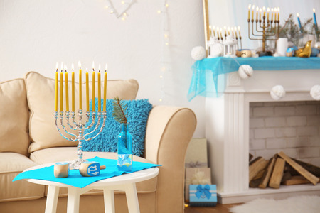 Beautiful decor for Hanukkah on stool in living room, closeupの写真素材