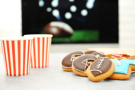 Creative cookies prepared for watching football match at homeの写真素材