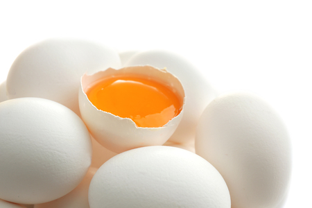 Raw eggs and yolk, closeupの写真素材