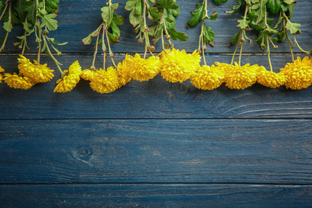Bouquet of beautiful flowers on wooden backgroundの写真素材