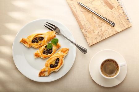 Tasty puff pastry with berries on plateの写真素材