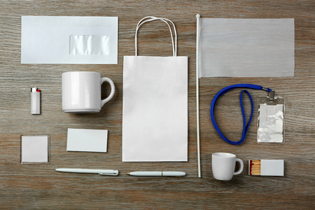 Set of blank items for branding on wooden backgroundの写真素材