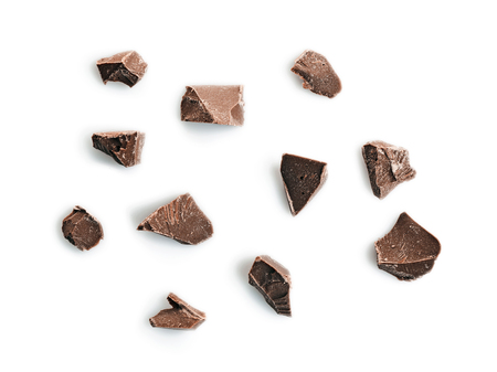 Pieces of tasty chocolate isolated on whiteの写真素材