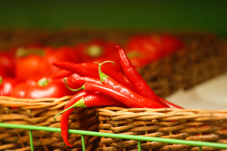 Basket with red pepper chili in marketの写真素材