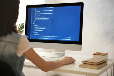 Woman working on computer at home