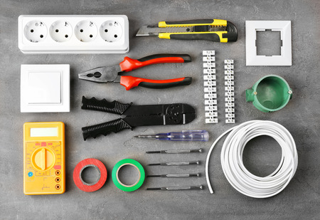 Different electrical tools on grey backgroundの写真素材