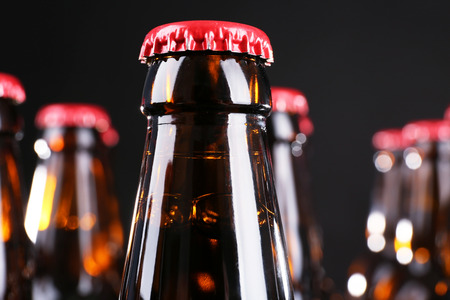 Bottles of beer on black background, closeupの写真素材
